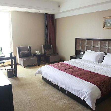 Weishi International Hotel Qing Zhou Esterno foto