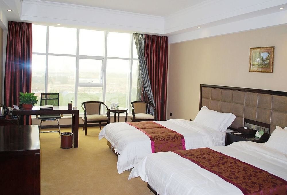 Weishi International Hotel Qing Zhou Esterno foto