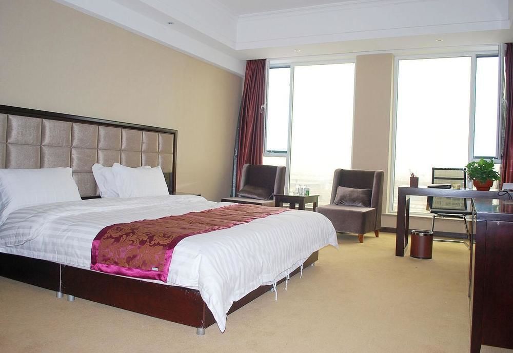 Weishi International Hotel Qing Zhou Esterno foto