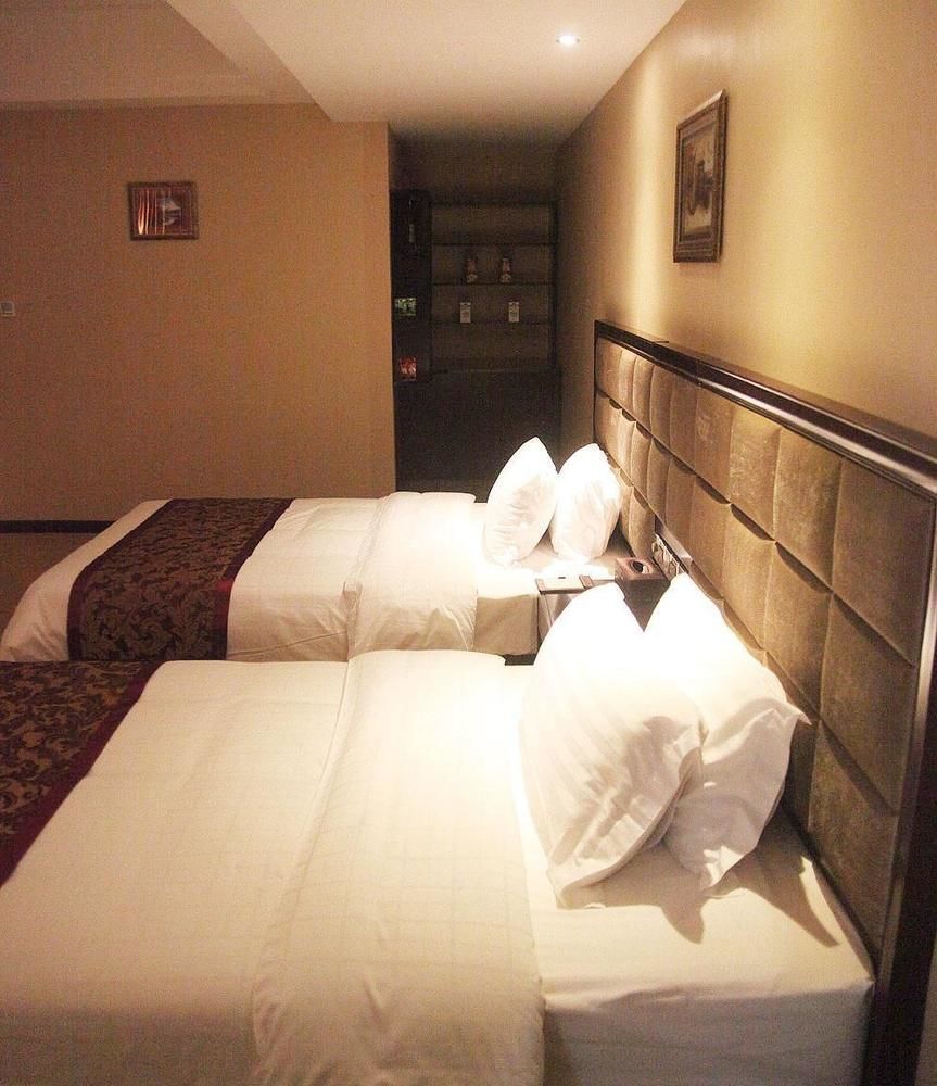 Weishi International Hotel Qing Zhou Esterno foto