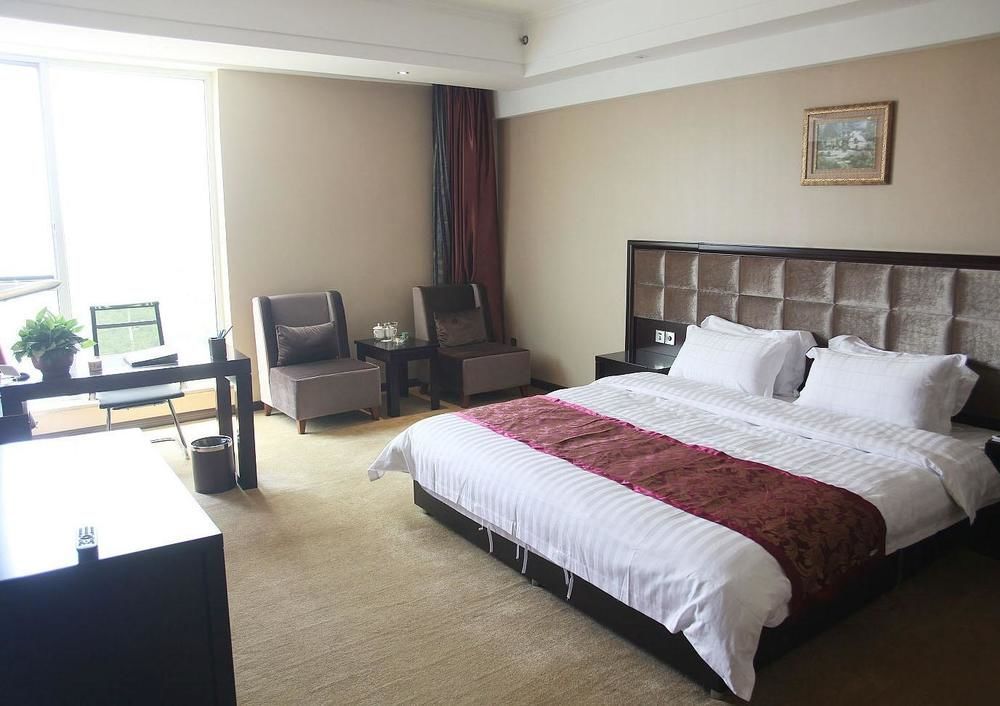 Weishi International Hotel Qing Zhou Esterno foto