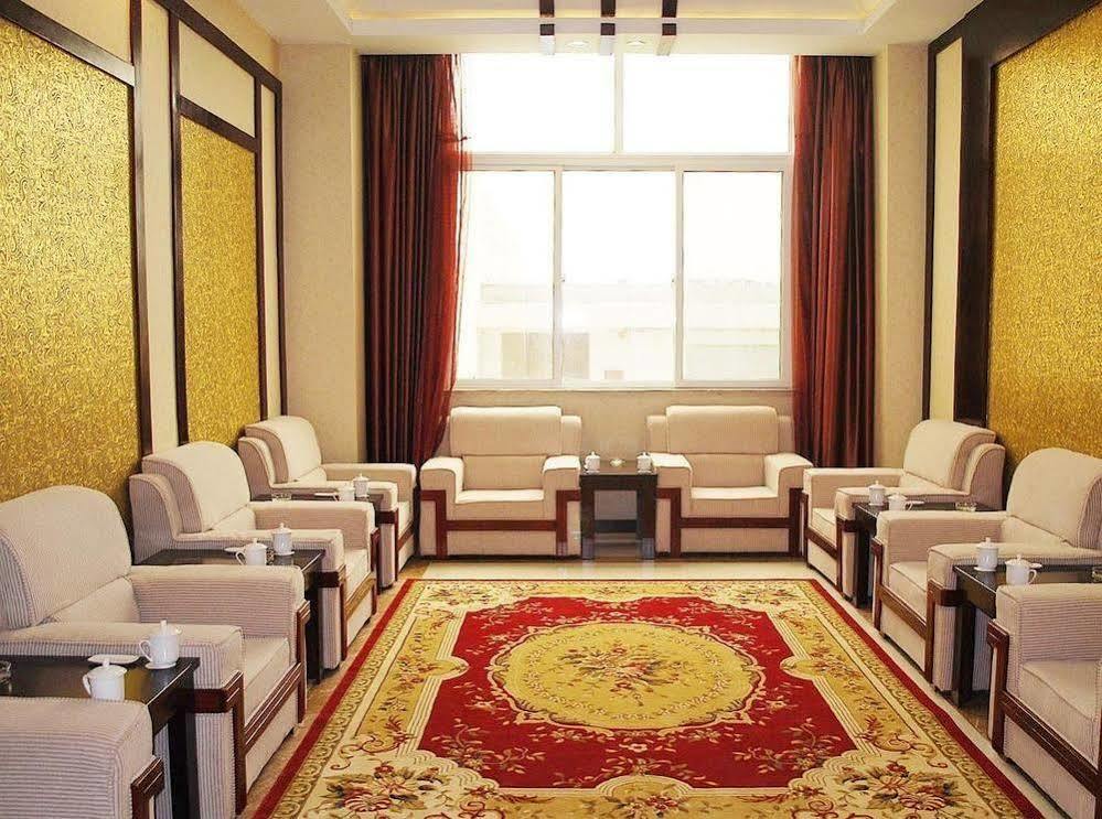 Weishi International Hotel Qing Zhou Esterno foto
