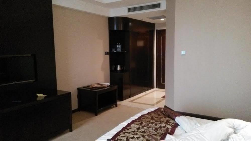 Weishi International Hotel Qing Zhou Esterno foto